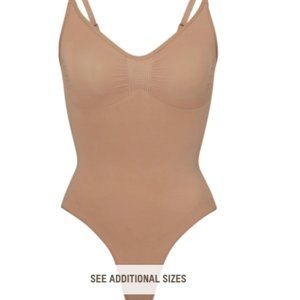 SKIMS Seamless Sculpt Thong Bodysuit in Sienna